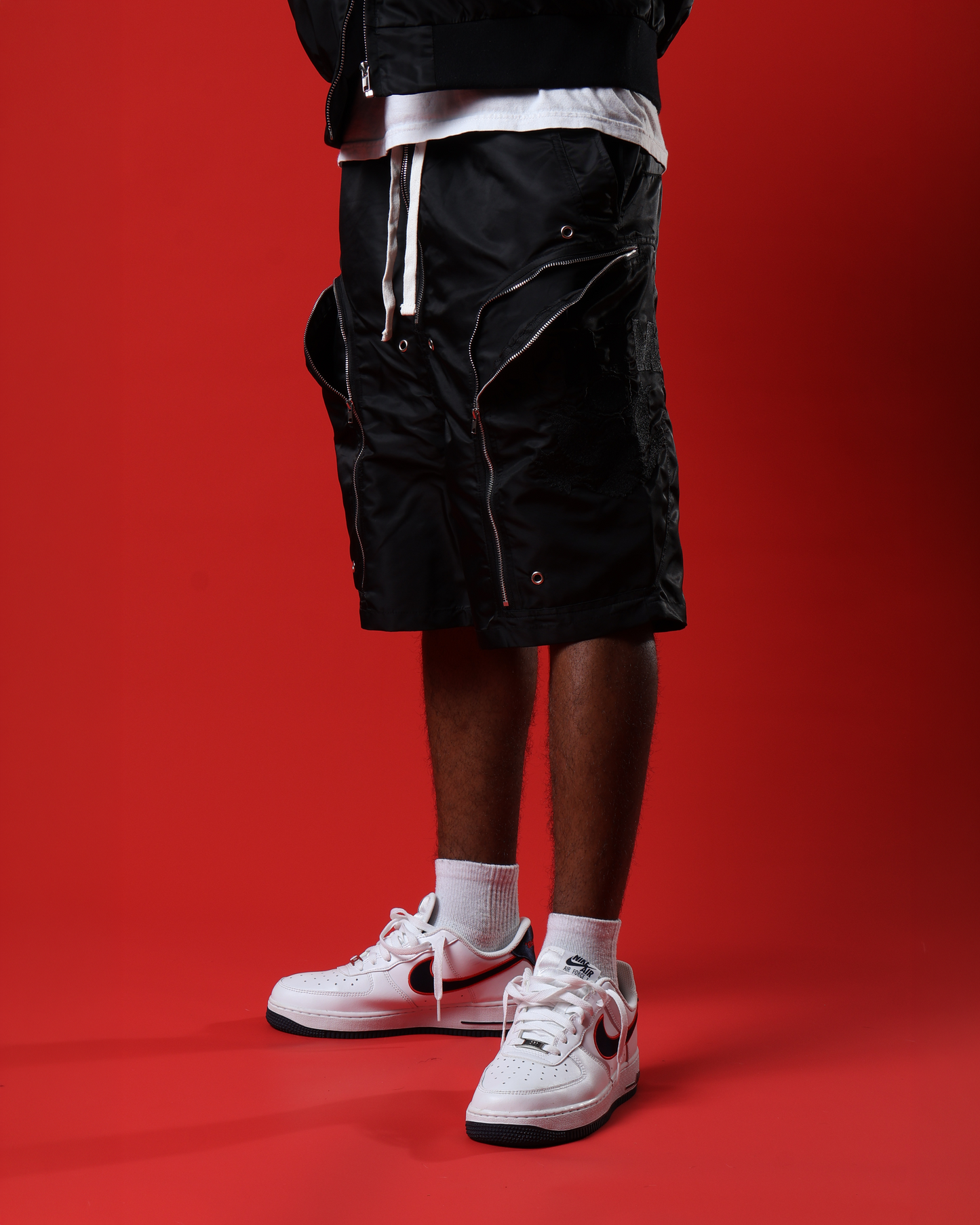 Black triple zip shorts