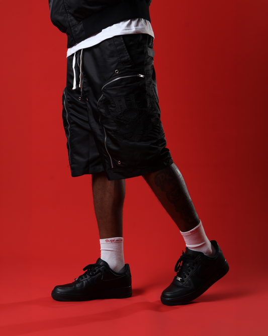 Black triple zip shorts