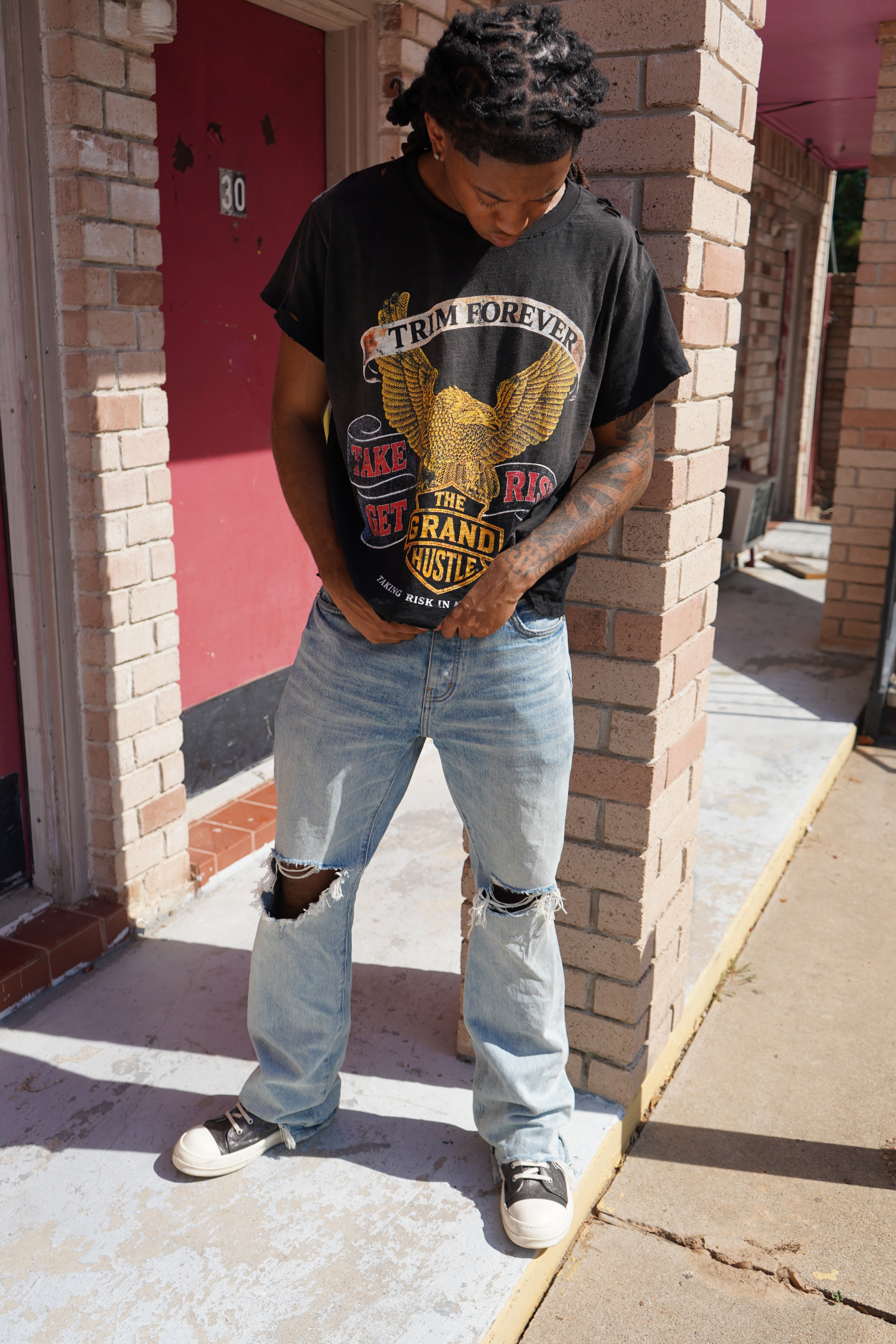 Black “the grand hustle” shirt